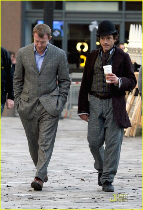 Guy Ritchi and Robert Downey Jr filming Sherlock Holmes