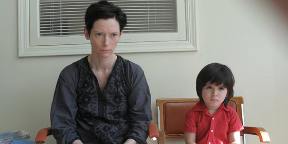 Tilda Swinton as Eva Khatchadourian and Jasper Newell as 6-8 year-old Kevin in We Need to Talk About Kevin